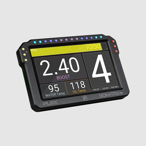 Diagonal left view of the PLEX SDM-700R Dash Display Logger showing boost, RPM, water temperature, oil temperature, and gear indicators with status indicators for GPS, logging, and performance measurements.