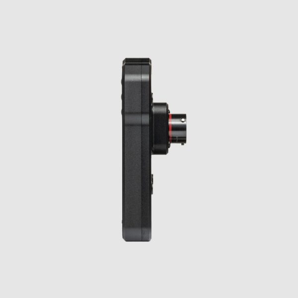 Side view of the PLEX SDM-700R Dash Display Logger showing its thin, lightweight enclosure and mildly protruding connector.